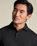https://www.charlestyrwhitt.com/dw/image/v2/AAWJ_PRD/on/demandware.static/-/Sites-ctshirts-master/default/dw46cf61d8/hi-res/JEP0453BLK_MODEL_DETAIL.jpg