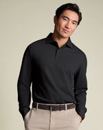 https://www.charlestyrwhitt.com/dw/image/v2/AAWJ_PRD/on/demandware.static/-/Sites-ctshirts-master/default/dwed42ae98/hi-res/JEP0453BLK_MODEL_TUCKED.jpg